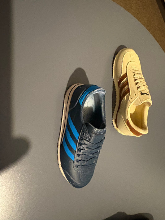 Adidas inspired colouring book with 2 3d printed trainers