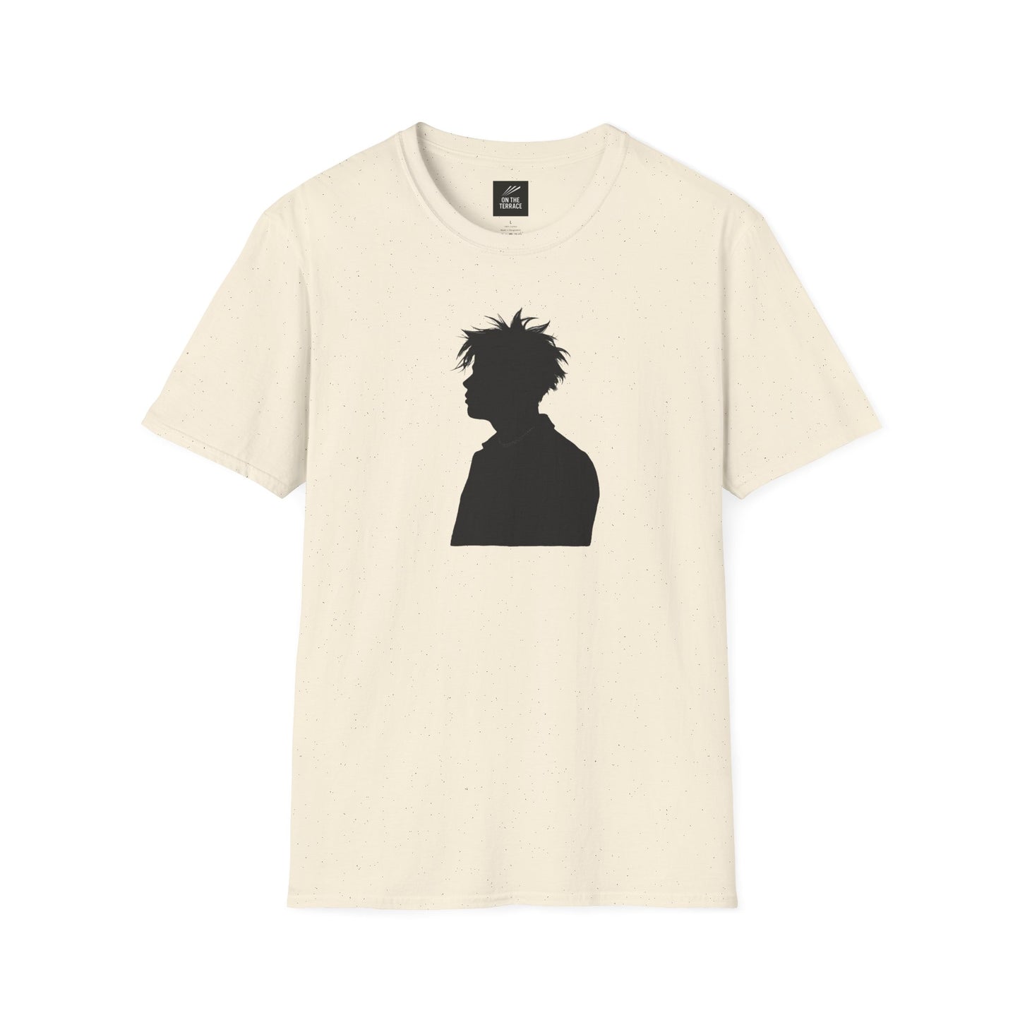 Cream-colored speckled t-shirt with black silhouette of person with messy hair on front