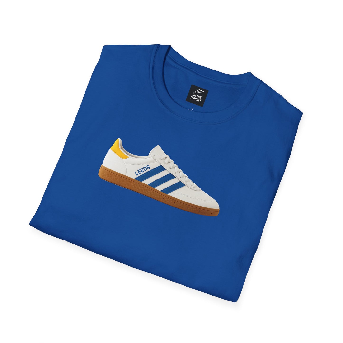 Blue t-shirt with graphic of white and blue sneaker labeled Leeds and yellow heel detail