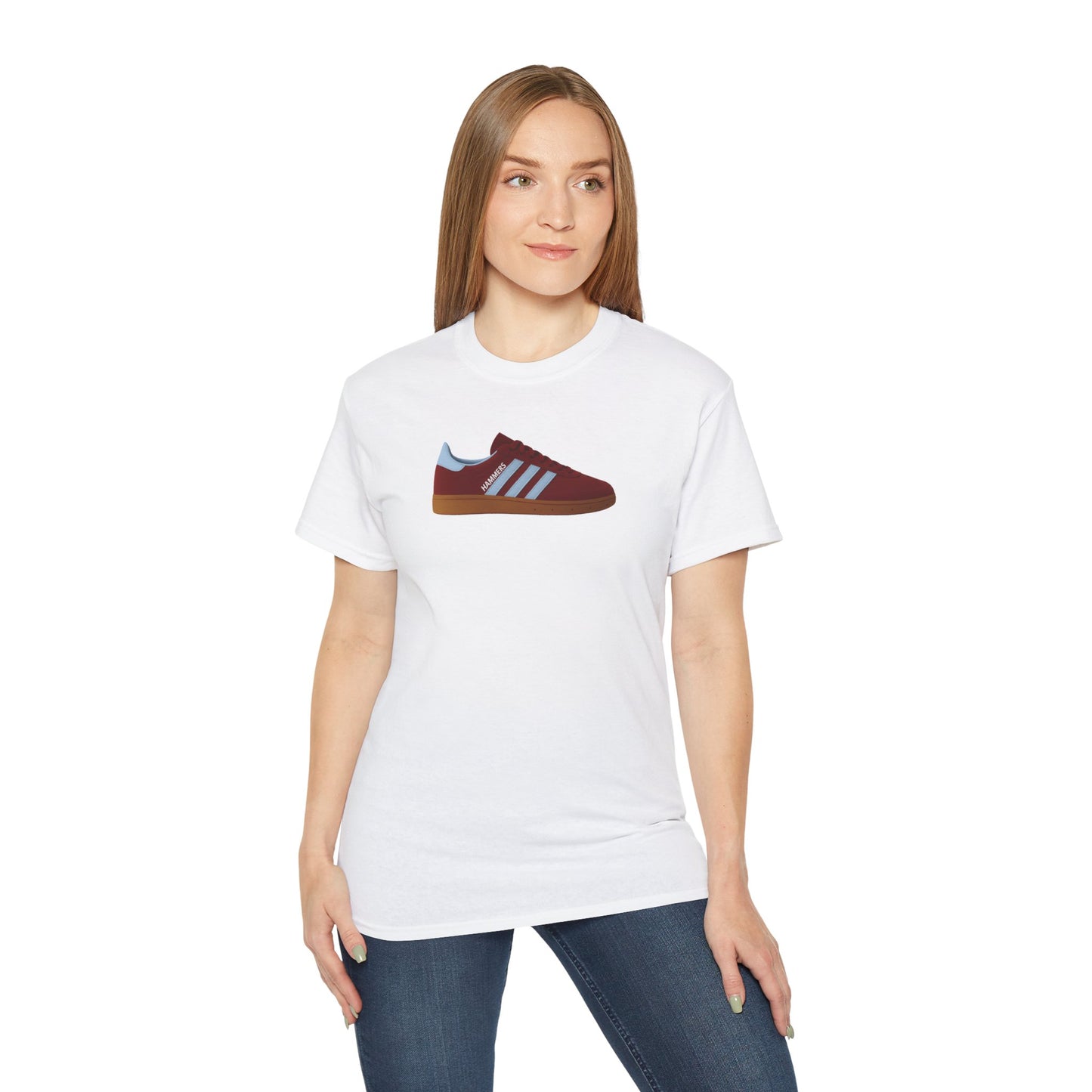 Woman wearing white t-shirt with graphic of maroon and blue sneakers and text HAMMERS
