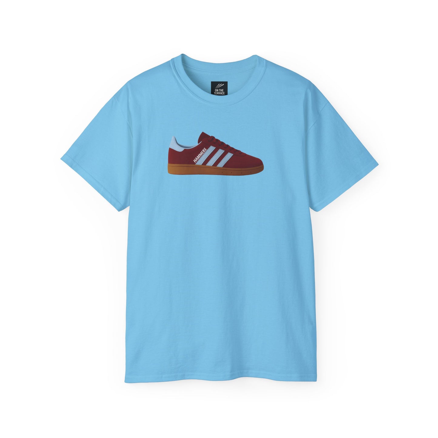 Light blue t-shirt with a graphic of a maroon sneaker featuring white stripes and gum sole