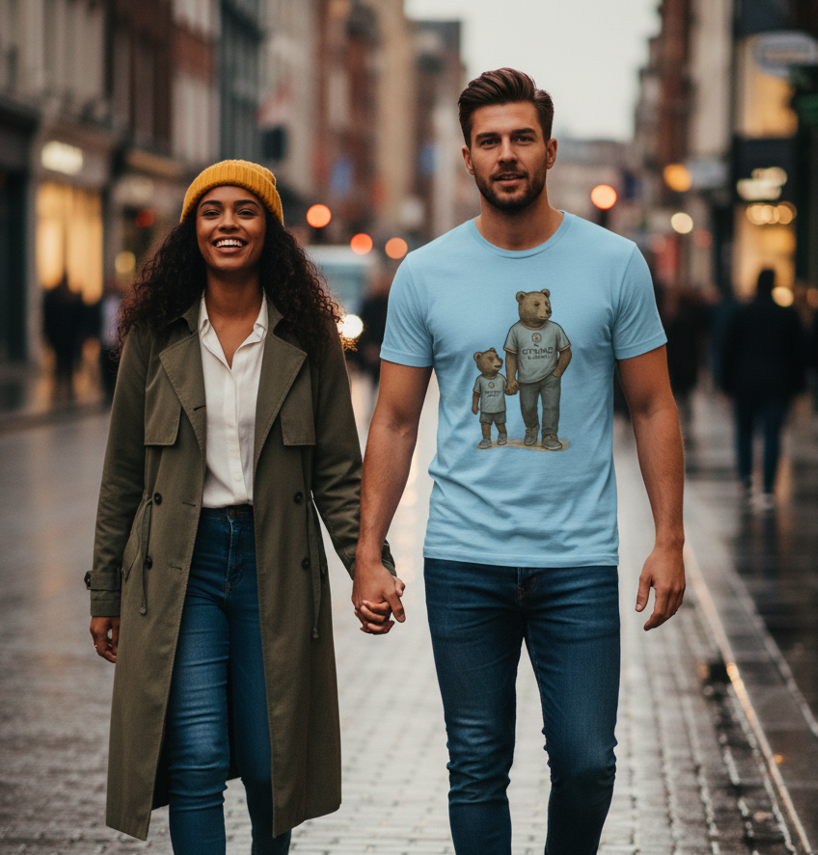 Young couple holding hands walking on rainy city street, man wearing light blue bear graphic t-shirt