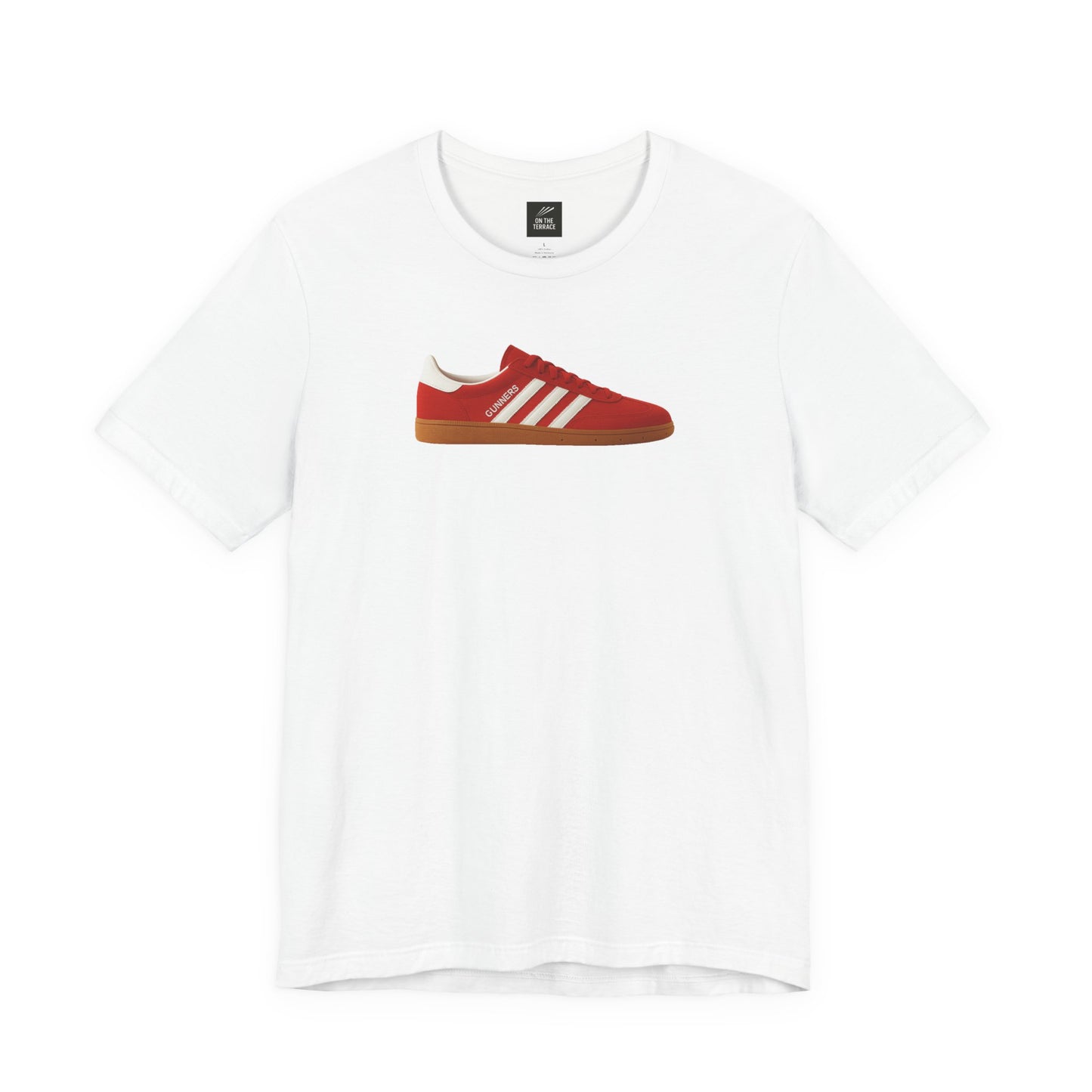 White t-shirt with a red sneaker graphic featuring white stripes and gum sole centered on front
