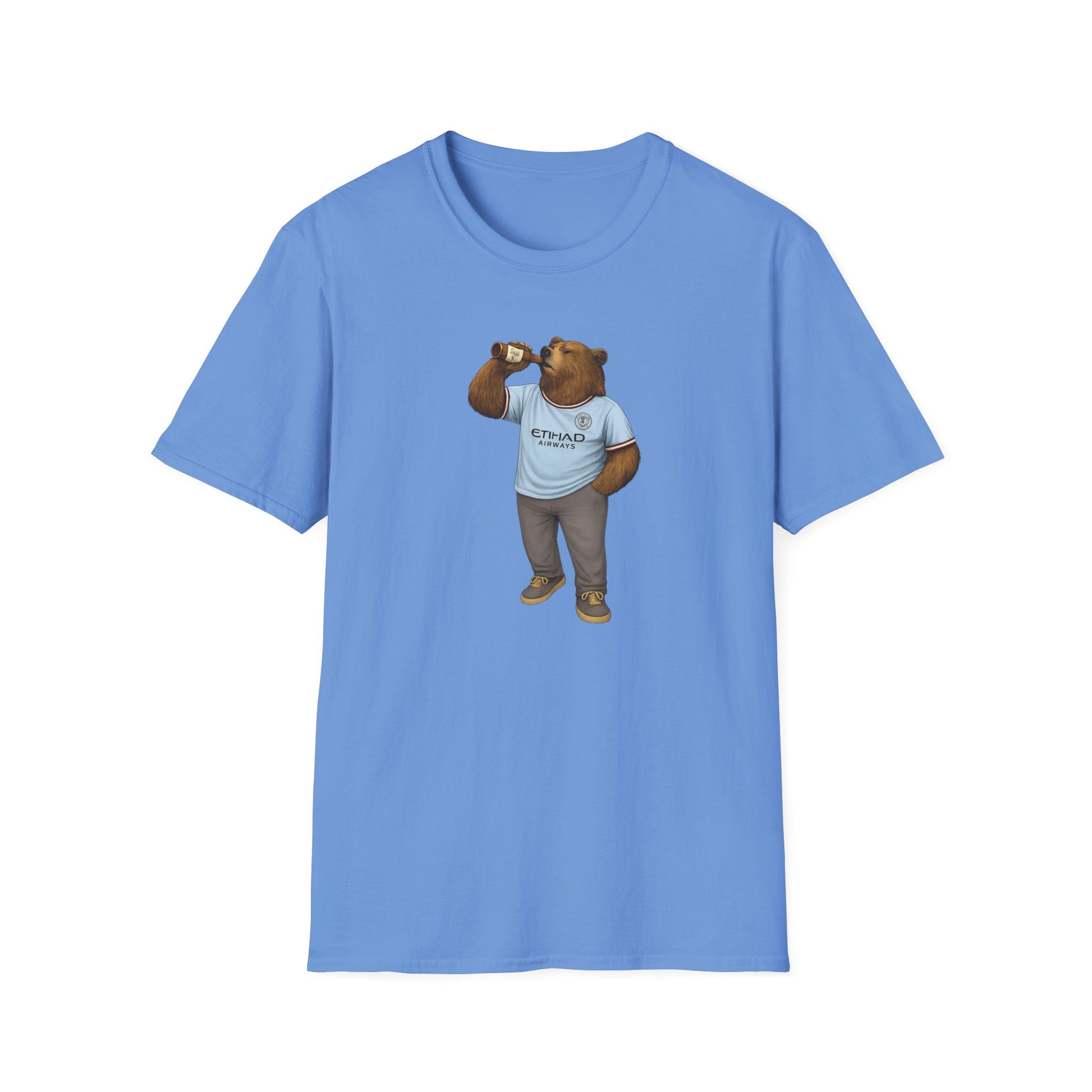 Blue t-shirt with graphic of a bear wearing a Manchester City jersey drinking from a bottle