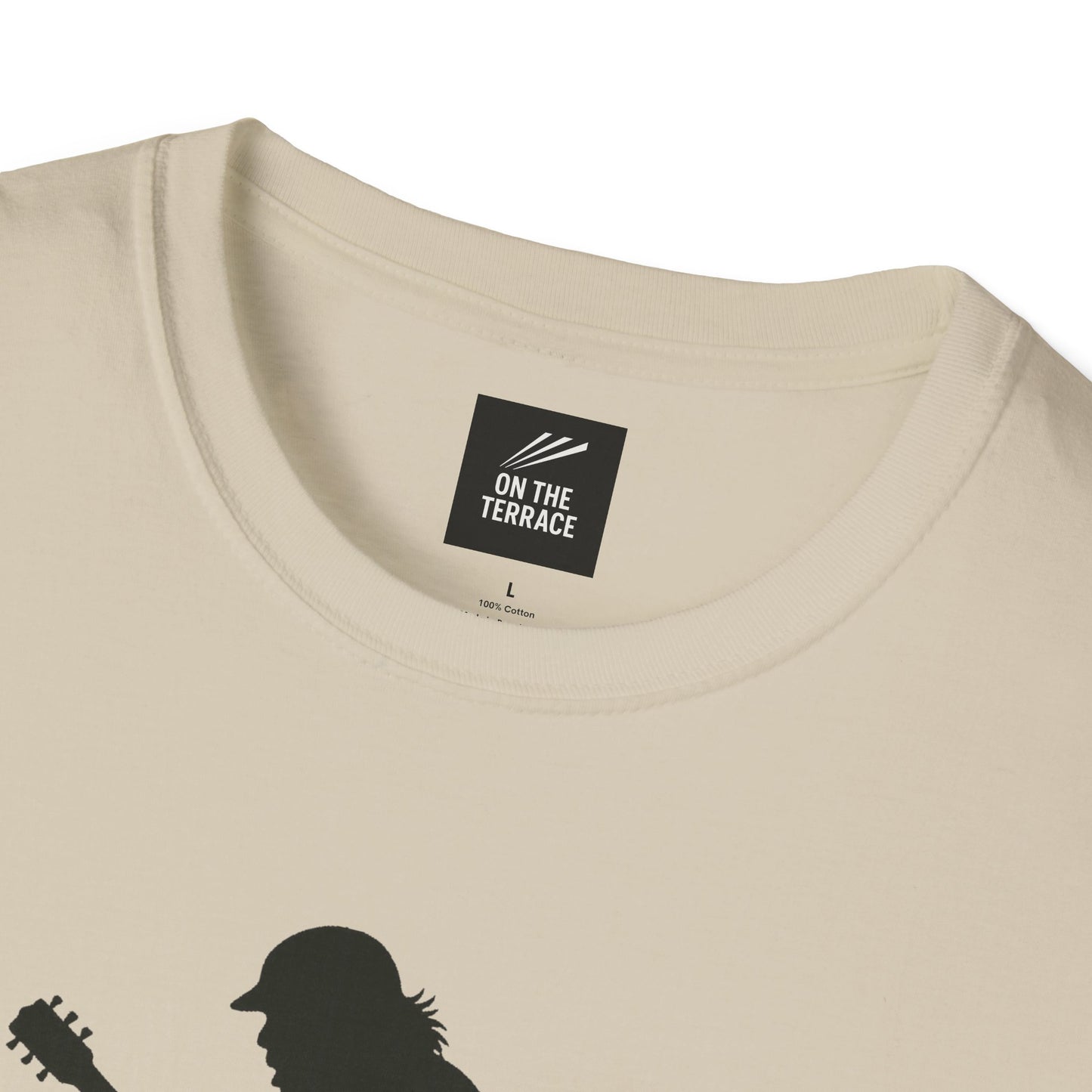 Close-up of beige cotton t-shirt collar with On The Terrace label and guitar player silhouette print
