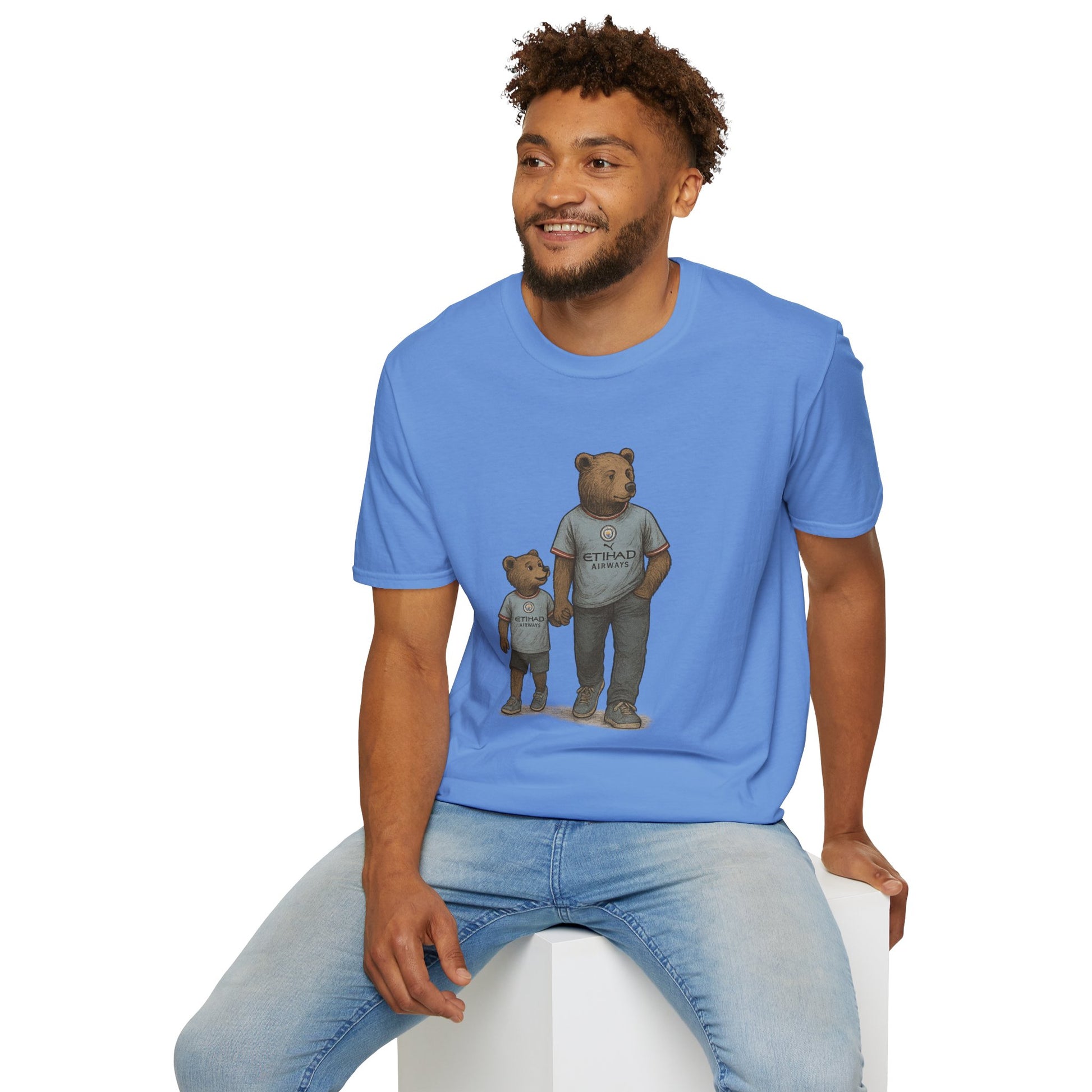 Smiling man wearing blue t-shirt with illustration of two bears in Etihad Airways shirts holding hands